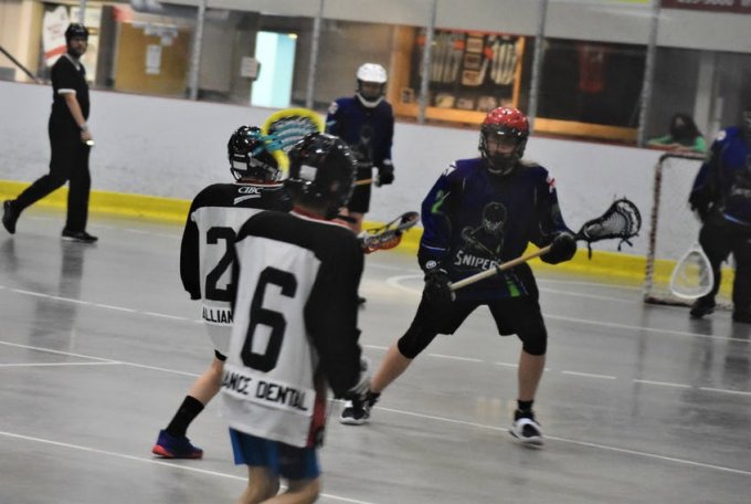 Pictou County U-13 Snipers player William Hussey prepares to defend a Bearcats’ attack during recent Scotia Minor Lacrosse League action in Truro. - Richard MacKenzie